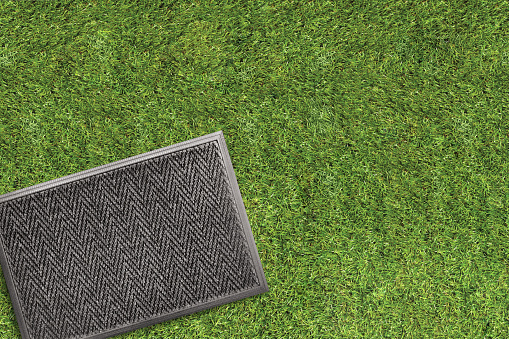 Floor mat on a grass background