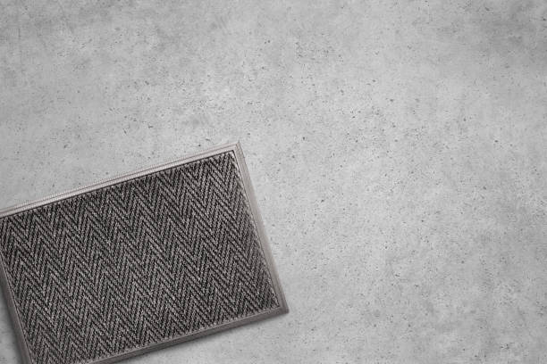 istock Floor mat on a cement floor background 2050612147