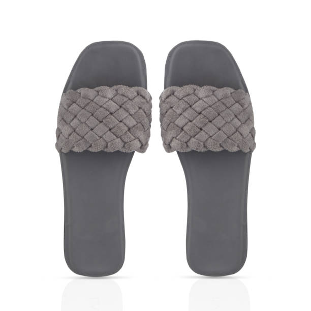 Top View Of Slippers Over White Background