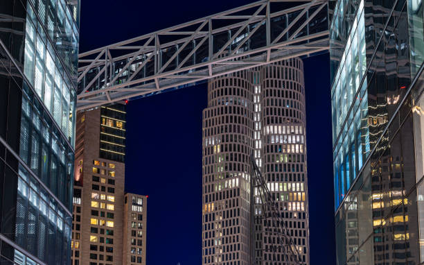 istock Skyscrapers between office buildings at night 2050626624