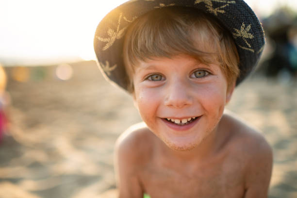 Cute little boy on the beach on summer holidays