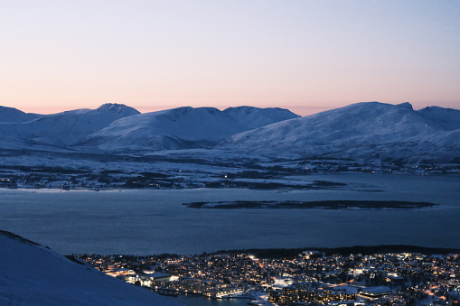 See Tromso at the top of the mountain
