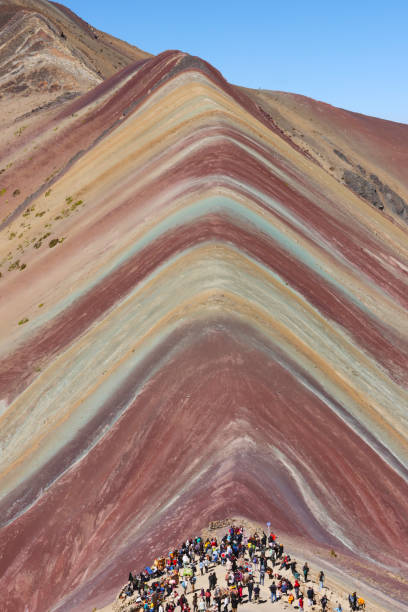 istock A vertical view of the rainbow mountain with tourists in Cusco, Peru 2050646507
