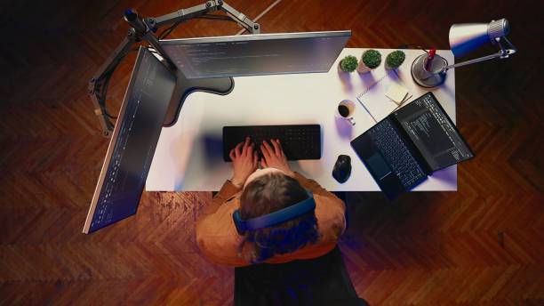 istock Top down view of fatigued software technician taking break 2050671712