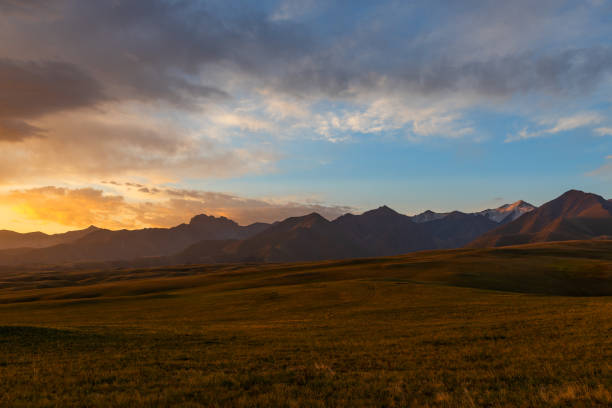 a picturesque mountain range and plateau in the mountains of the dzhungar alatau on the border of kazakhstan and china - alatau - fotografias e filmes do acervo