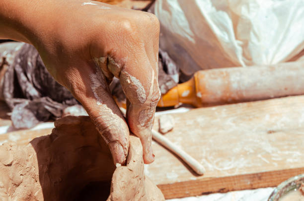 Potter's hands close-up. Clay products. Fine hand motor skills