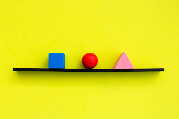 istock Three colorful wooden geometric figures 2050690260