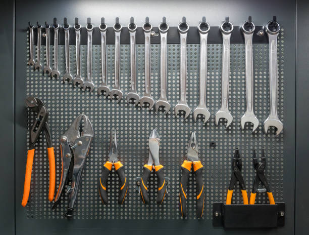 istock Collection of mechanic hand tools hanging on tool board 2050731215