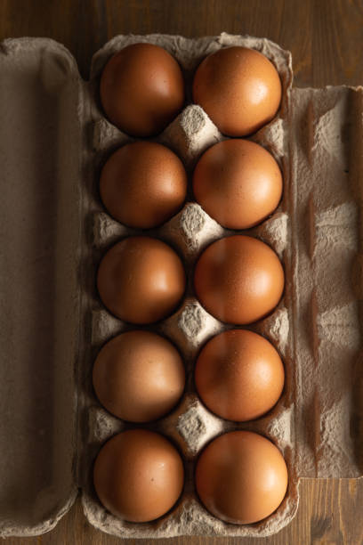 istock Eggs from a hen in a biodegradable cardboard box top view. 2050750203