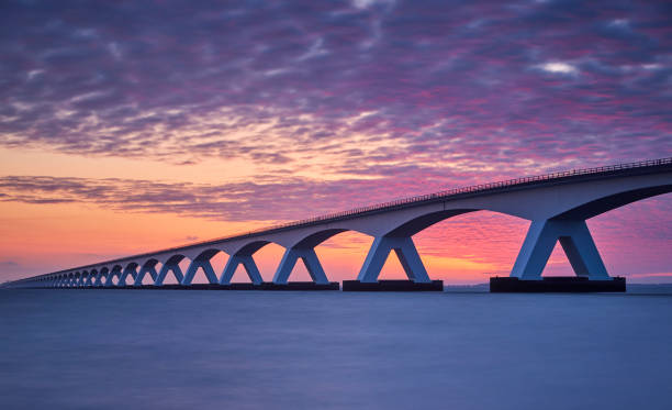 istock Zeeland Bridge, The Netherland during a beautiful and dramatic sunrise 2050756598