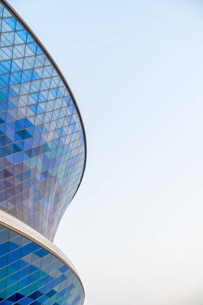 istock modern building exterior with abstract curve and copy space. 2050786186