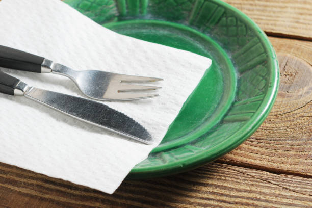 istock Green plate and cutlery 2050800271