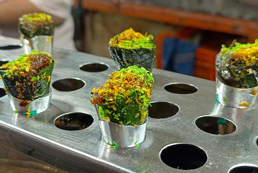 Sweet paan, meetha pan, Betel leaves mouth Freshener, Traditional indian dessert Paan made with Betel leaf and other ingreditients is eaten as a dessert and also aids as a mouth freshner.