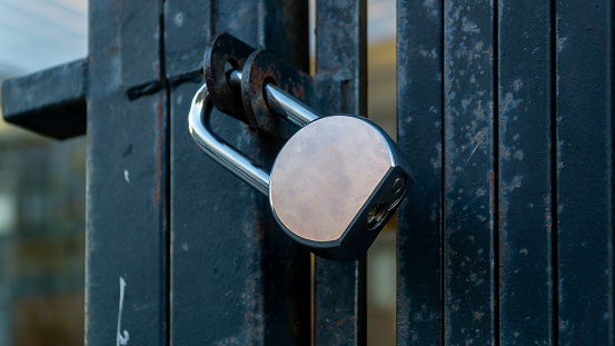 San Francisco, USA - August 2019: Close up of a metal lock on a metal door