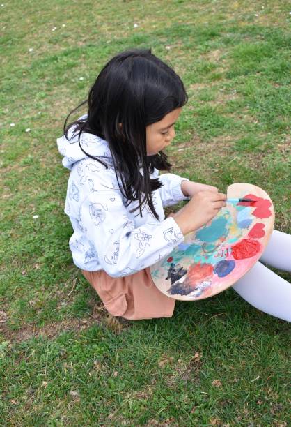 istock Girl painting 2050839724