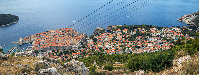 Panoramic view of Dubrovnik, Croatia. Overview of the medieval old town with fortified walls and the tourist harbor. It was included in 1979 on the UNESCO list. Filming location for several films.