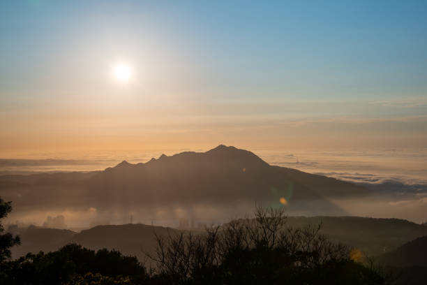 istock The sun, mountains and clouds create a wonderful symphony at dusk. 2050879563