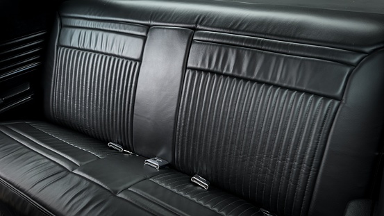 Rear bench seat inside of a car