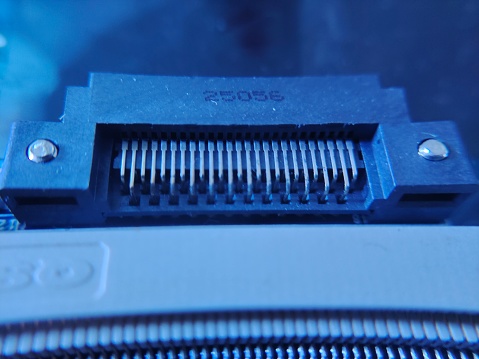 The close-up image of port connectors on electrical components. Each connector, meticulously crafted and aligned, serves as a gateway for the seamless transmission of power and data.