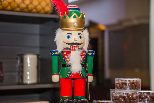 Christmas nutcracker with beard and green and blue suit