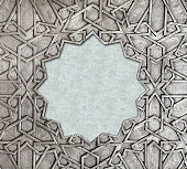 Frame with traditional islamic ornament. Copper window shutter with antique and national moroccan floral pattern. Oriental ornaments with artistic with chasing for brass. Copy space for text