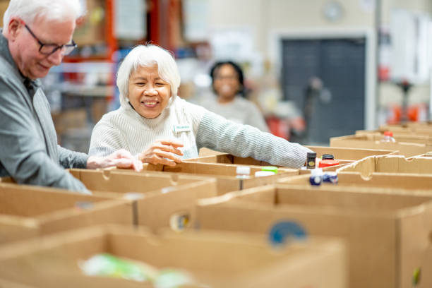 istock Senior Couple Volunteering 2051013955