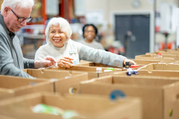 istock Senior Couple Volunteering 2051013957