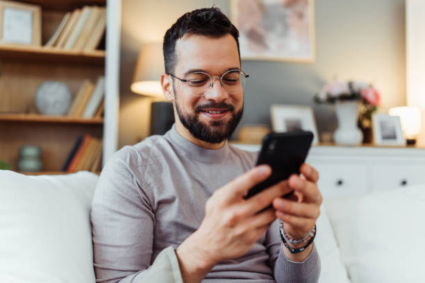 istock Handsome man relaxing in his home 2051062461