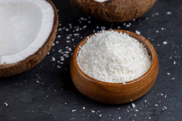 istock dry white coconut chips for adding to desserts 2051073360