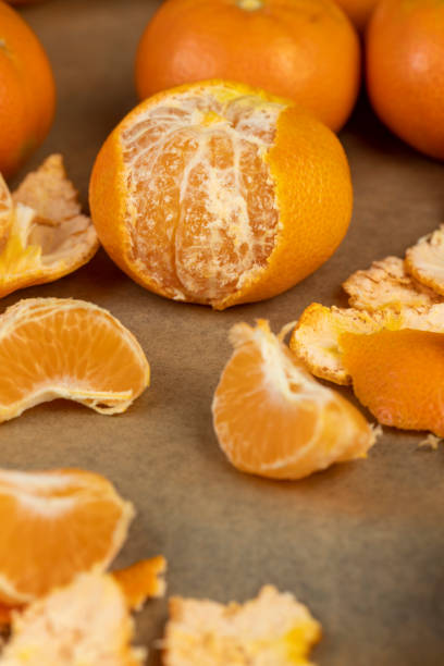 istock cleaning and preparing ripe tangerines for cooking 2051074493