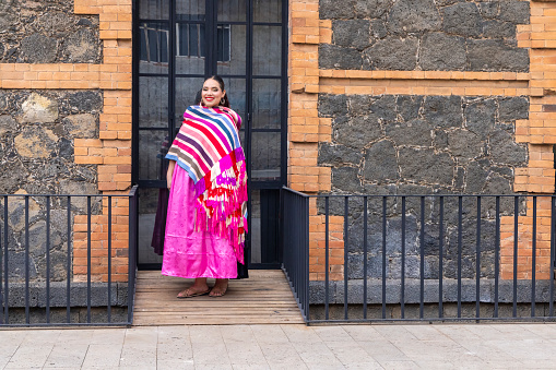 Indigenous woman in traditional dress from Uruapan Michoacan