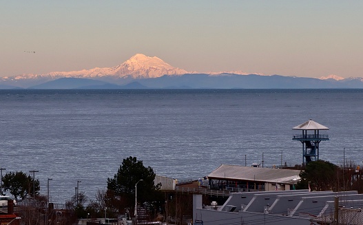 Mt. Baker sunset from Port Angeles, Washington with its City Pier tower