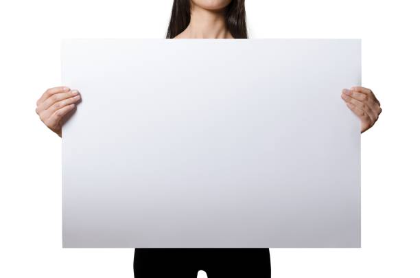 istock Close up view female hand hold on white paper board. 2051086689