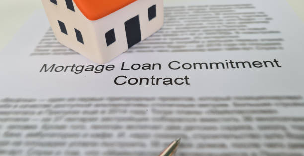 istock Mortgage agreement for a river and house 2051094201