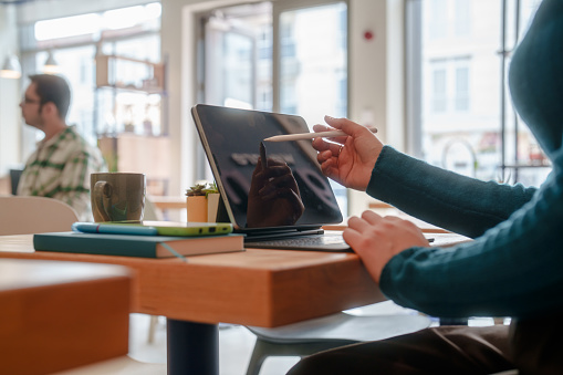 Part of a series: Diverse people working in an office, meeting and collaborating