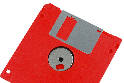 Flexible magnetic disc in a flat square case. With a capacity of 1.44 MB and a diameter of 3.5 inches, it is designed to store digital data that can be read and written using an appropriate drive.