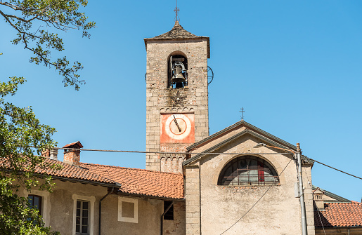 Bell tower of the Parish Museum of the Abbey of Saint Gemolo in Ganna, Valganna, province of Varese, Italy