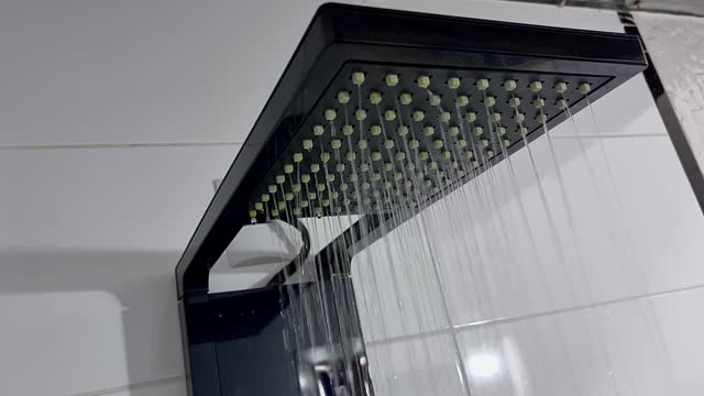 Beautiful and sophisticated shower opening and releasing water