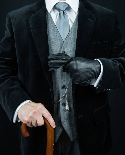 istock Stylish Gentleman in Suit and Leather Gloves 2051165836