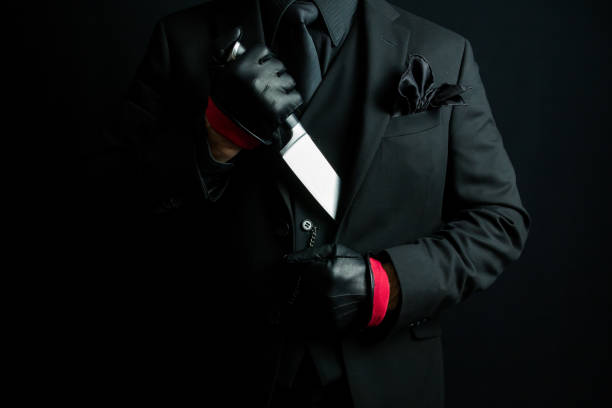 istock Stylish Gangster Pulling Knife From Suit 2051165856