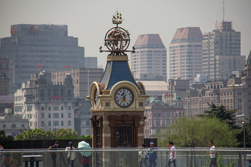 Shanghai, China - april 16, 2017 - The Disney Clock Tower in the middle of Shanghai is a symbol of Walt Disney and its famous cartoons