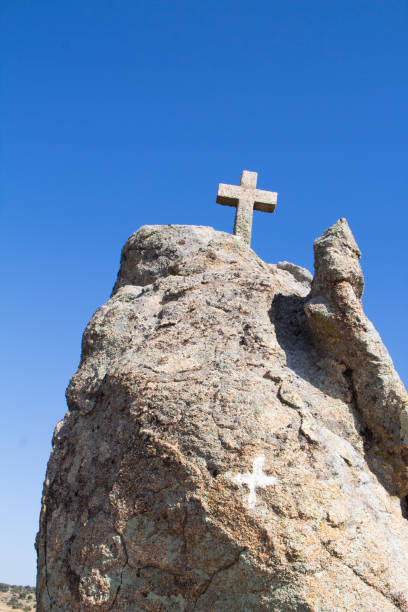 istock Rock with a cross. religious symbol 2051216352