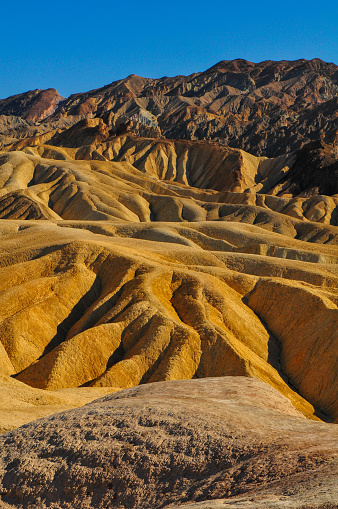 The spectacularly eroded geological wonderland surrrounding Zabriskie Point, Death Valley National Park, California, USA.