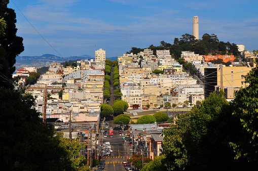 A view of Lombard Street, Coit Tower and Telegraph Hill from the Russian Hill district, San Francisco, California, USA.