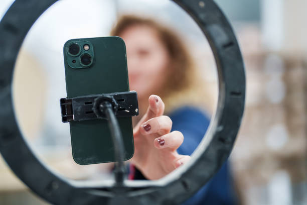 istock Woman shooting a marketing video about ceramic works. 2051318532