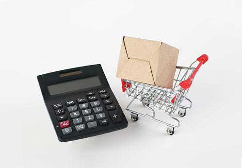 Online shopping, Shopping cart boxes and calculator, import export, finance commerce