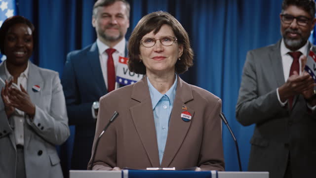 Caucasian Female US Governor Campaigning for Reelection at Press Conference