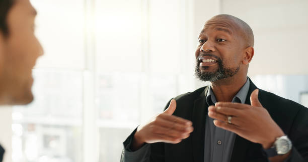 istock Business men, discussion and handshake for collaboration and communication, networking in meeting for feedback. Welcome, introduction and team in office, corporate partnership in conversation for b2b 2051360278