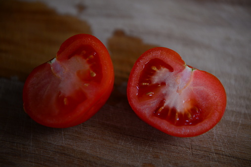 Tomatoes cut on a cutting board
