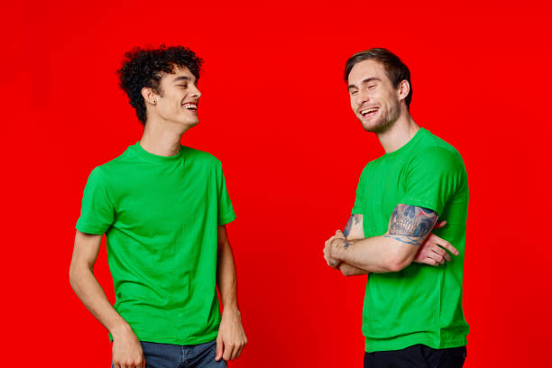 istock Cheerful friends are standing next to communication fun red background 2051457291
